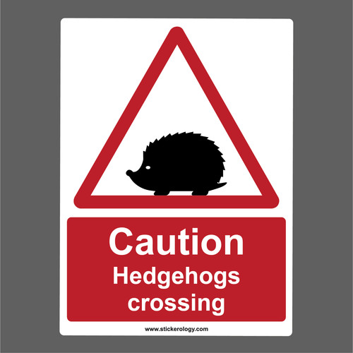 Caution hedgehogs crossing - caution,