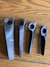 Four used Bong type  pitons