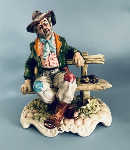 Capodimonte tramp on bench - tramp,