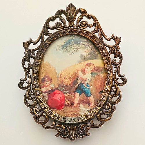 Ornate oval metal photo frame - photo,