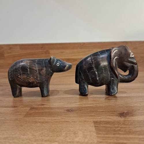 Pair soapstone figures - of,