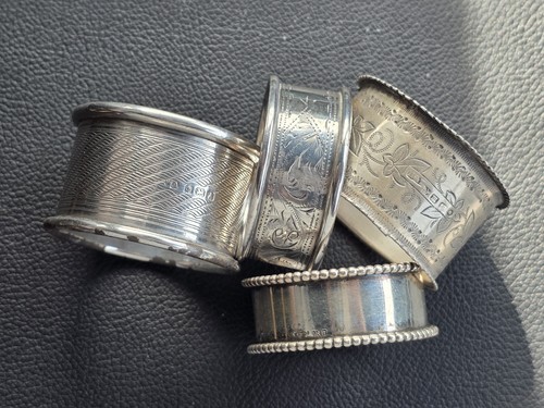 Four sterling silver napkin - four,