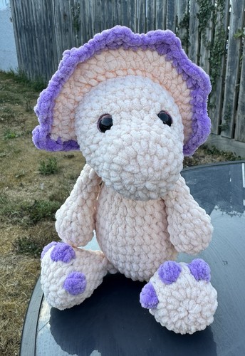 Plush crochet dinosaur