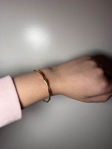 Gold tone twisted - tone,