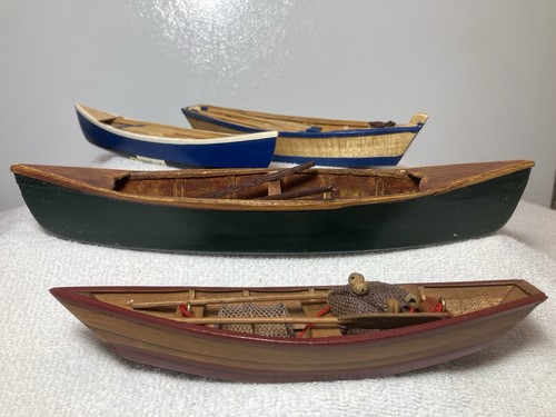 Lot wooden canoes with - of,