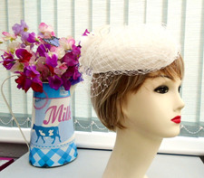 True Vintage  1980,s  Yessica white  pill box hat  with veiling and flourish