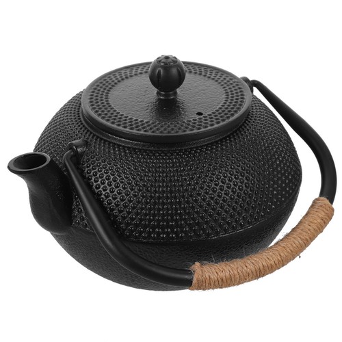 Metal tea kettle cast - metal,