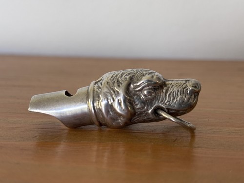 Silver dog whistle in - dog’s,