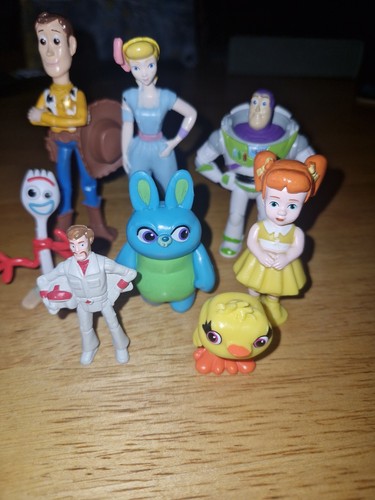 Toy story figures - 4,