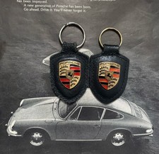 Two Genuine Porsche keyrings