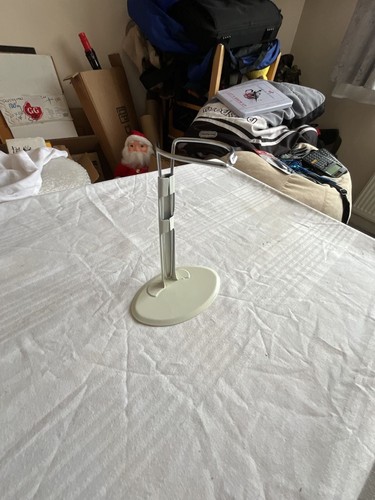 Adjustable metal doll display - adjustable,