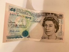 Old five pound note - five,