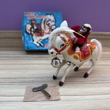 Ms 764 Monkey Riding Horse Tin