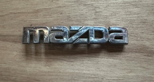 Mazda car badge emblem - car,