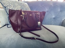 Coach: Burgundy Leather Bag