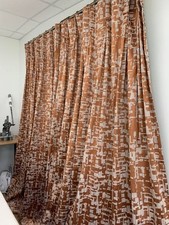 Pair of extra long rust and natural pinch pleat FR curtains