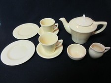 Mini Yellow Ceramic 2 cup Tea Set: Teapot, Saucers, Plates, Milk Jug, Sugar Bowl
