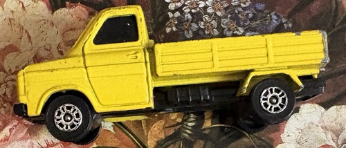 Die cast yellow pickup - die-cast,