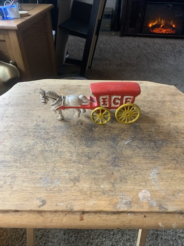 Antique cast iron horse drawn - cast,