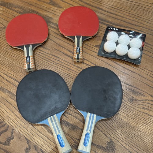 Tiga ping pong - pong, paddles