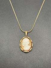 Gold tone cameo pendant