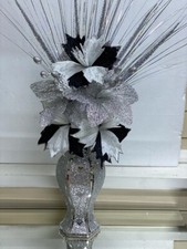 Silver vase with - with, flowers