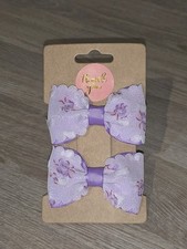 Handmade Grosgrain And Voile Floral Ribbon Hair Clips measuring 6x3 cm.