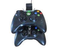 Two Microsoft Xbox 360 wireless controllers plus twin Gamexpert USB charger