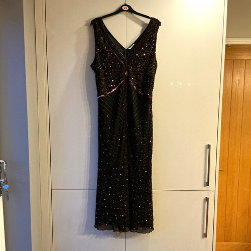 Black beaded neck sleeveless - v-neck,