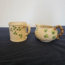 Belleek porcelain shamrock basket weave cream jug and Mug