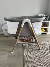 baby crib and moses basket