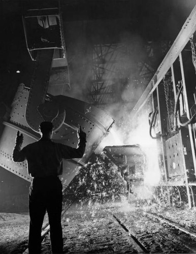 Steelworker processes molten - steelworker,