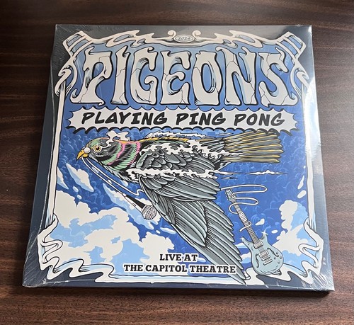 Pigeons playing ping pong - ping,
