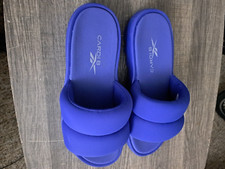 Cardi B Reebok flip flops