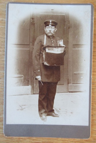 Old photo postman newspaper - photo,