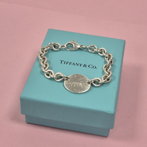 Tiffany vintage return - &,