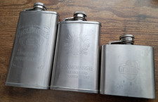 THREE WHISKY HIP FLASKS -