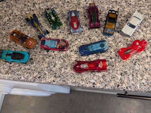 Assorted hotwheels cars - 12,