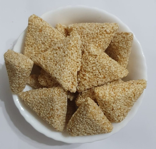 Till samosa sesame sweet - (sesame,
