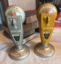2 Advertising Paperweights for