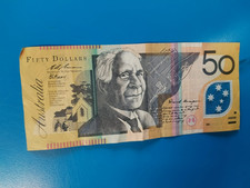 Uncirculated Australian 50 dollar note QC95540832 David Unaipon and Edith Cowan