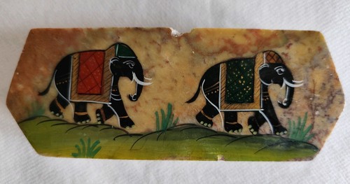 Hand carved elephant design - carved,