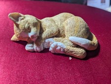 Sleeping ginger cat resin ornament