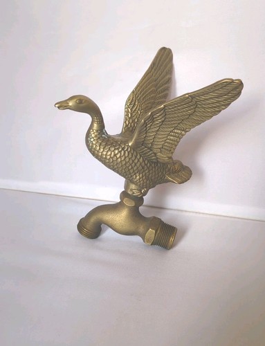 Vintage brass flying duck - vintage, /