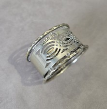 antique silver napkin ring hallmarked "EPNS" for Electro-Plated Nickel Silver.