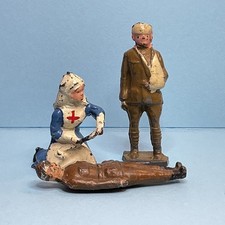 Crescent Kneeling Nurse With