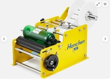 Manual round bottle labeling - round,