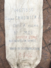 Original WWII canvas kit or duffel bag with clasp showing details of owner
