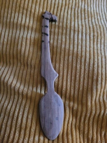 Handcarved small wooden spoon