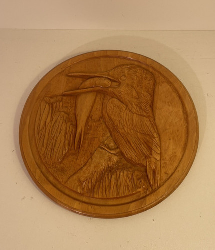 Hand carved wooden kingfisher - hand,